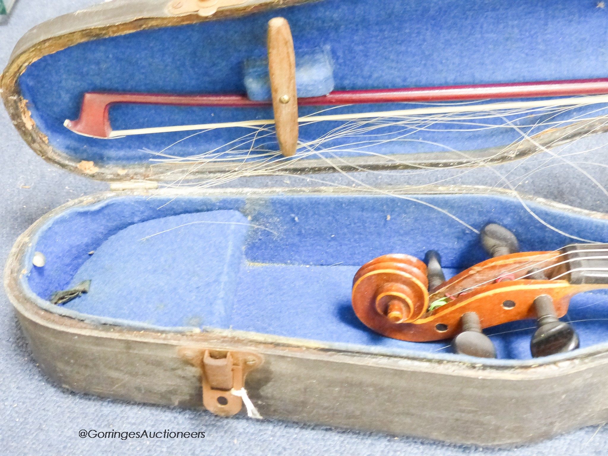 A student violin in case